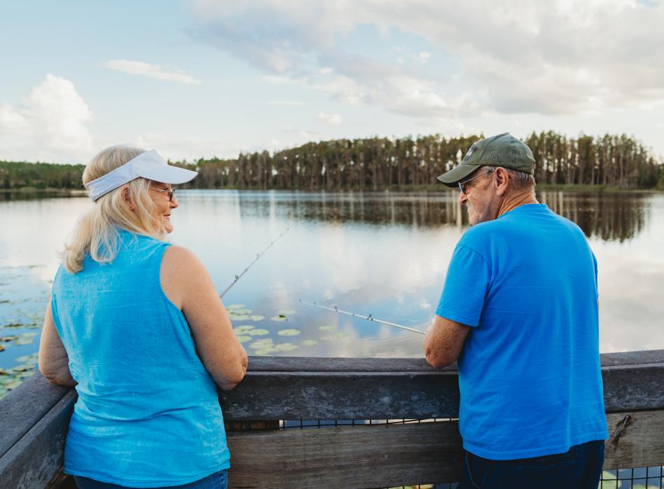 Couple fishing on a dock