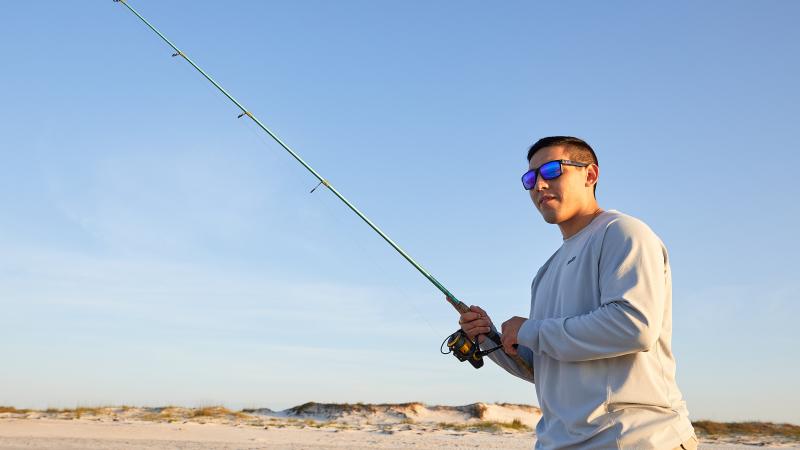 Man fishing on beach